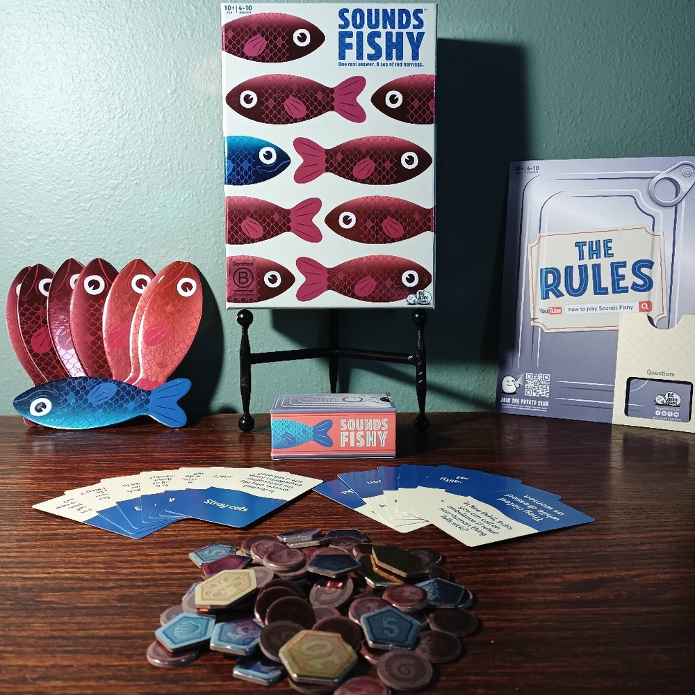 Sounds Fishy Board Game Ages 10 to Adult with Blue and Red Fish 4 to 10 Players